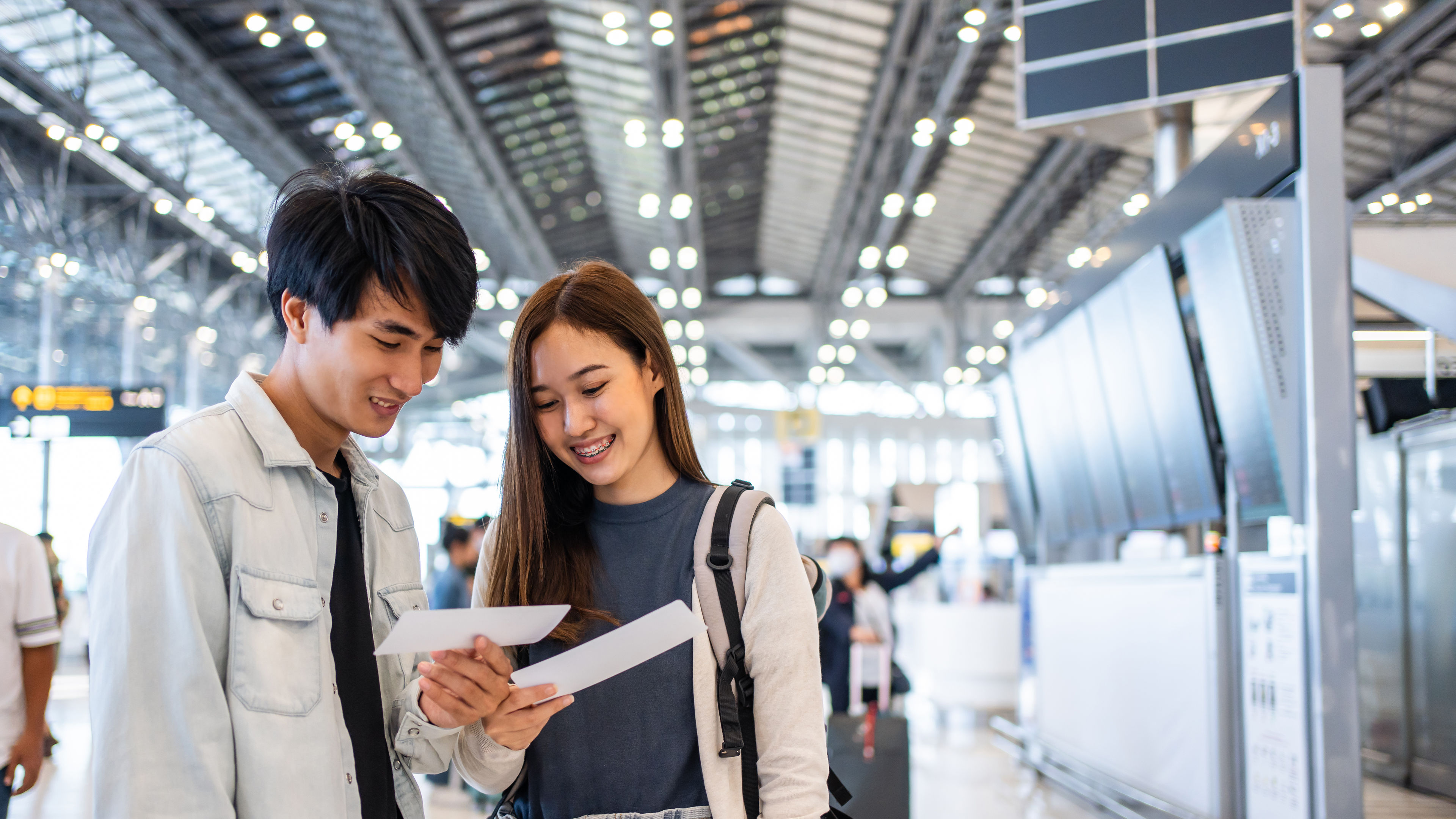 Asian couples in airport