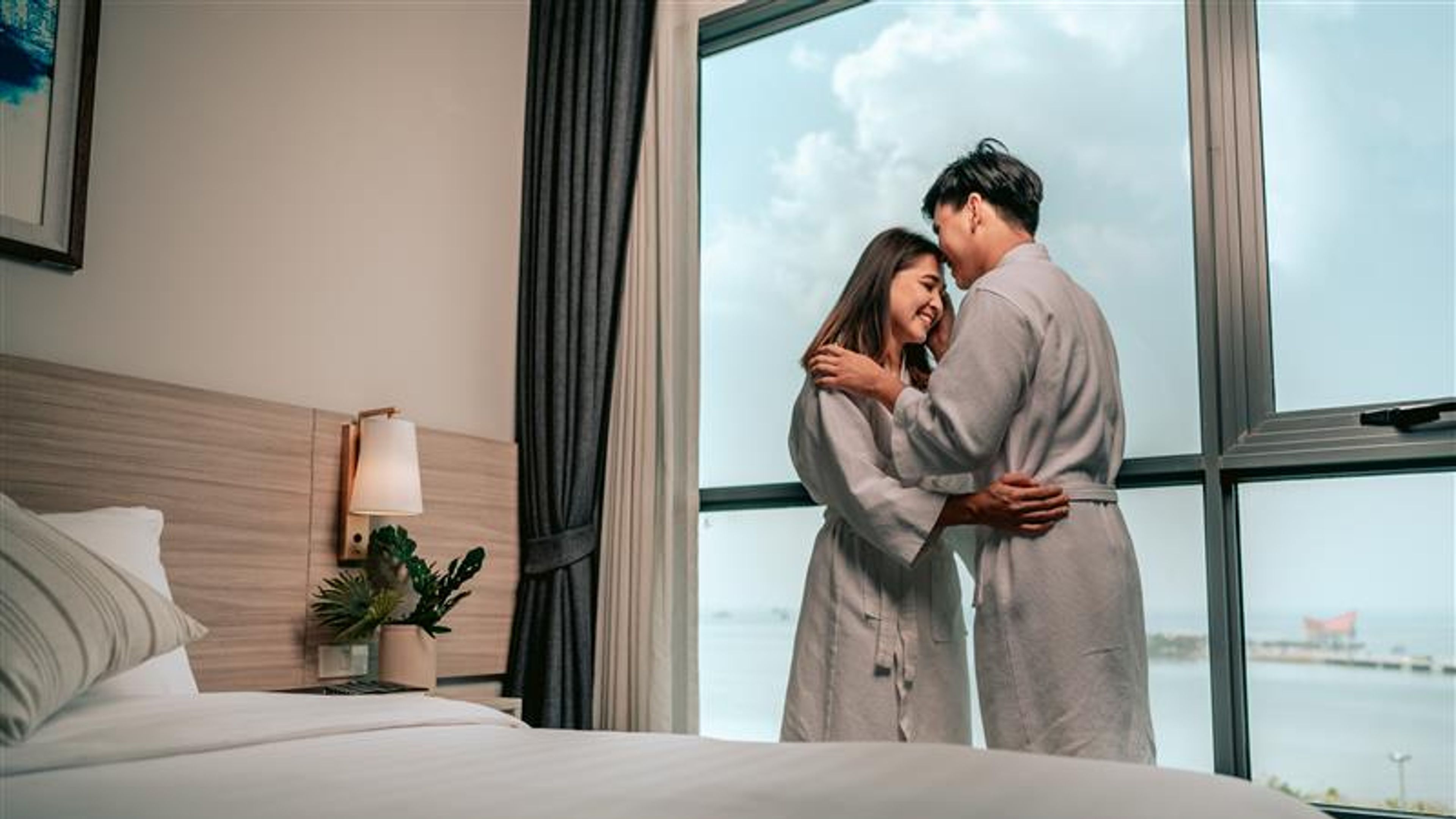 Asian couples in hotel room