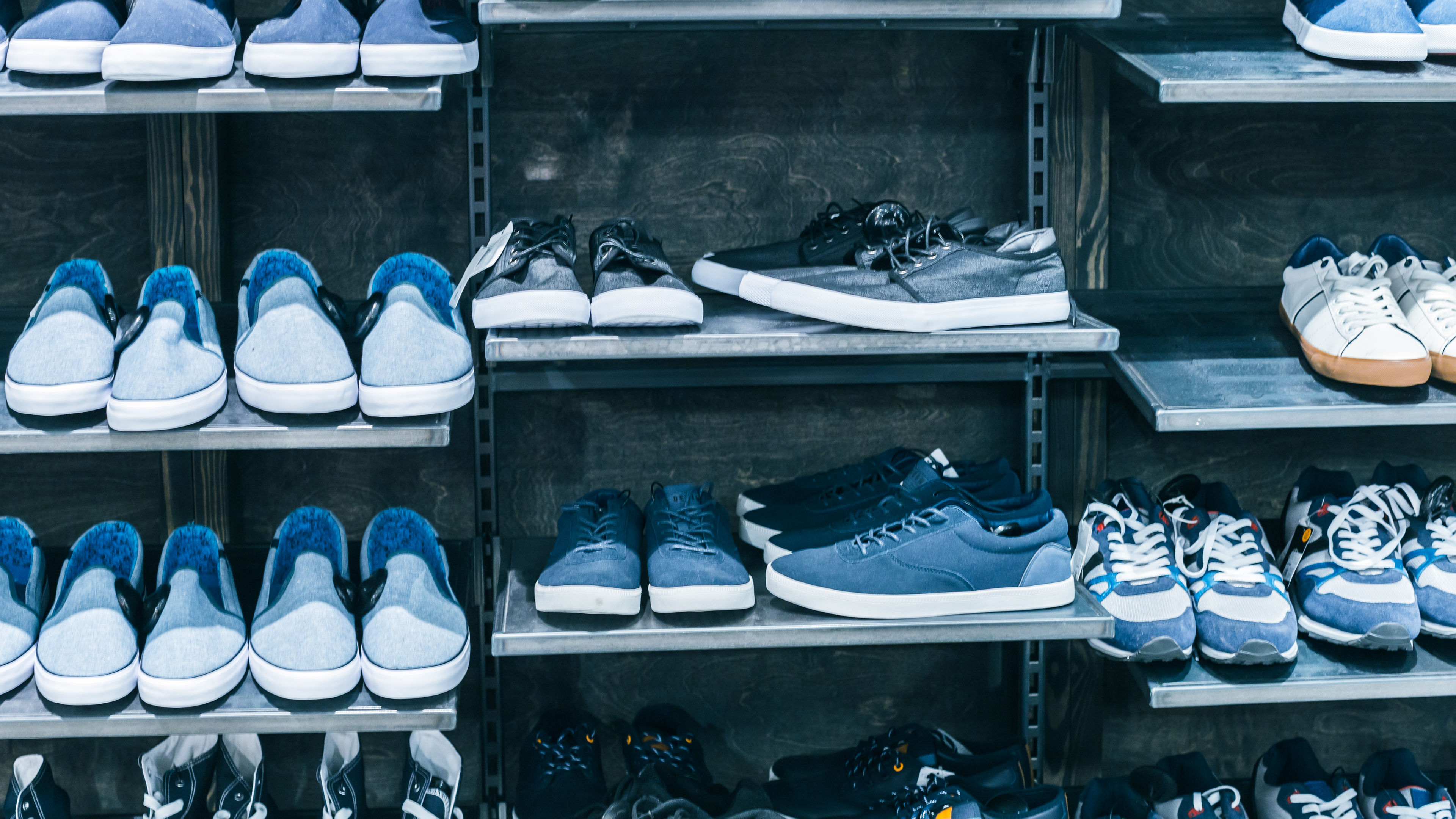 Multiple pairs of blue shoes collection.