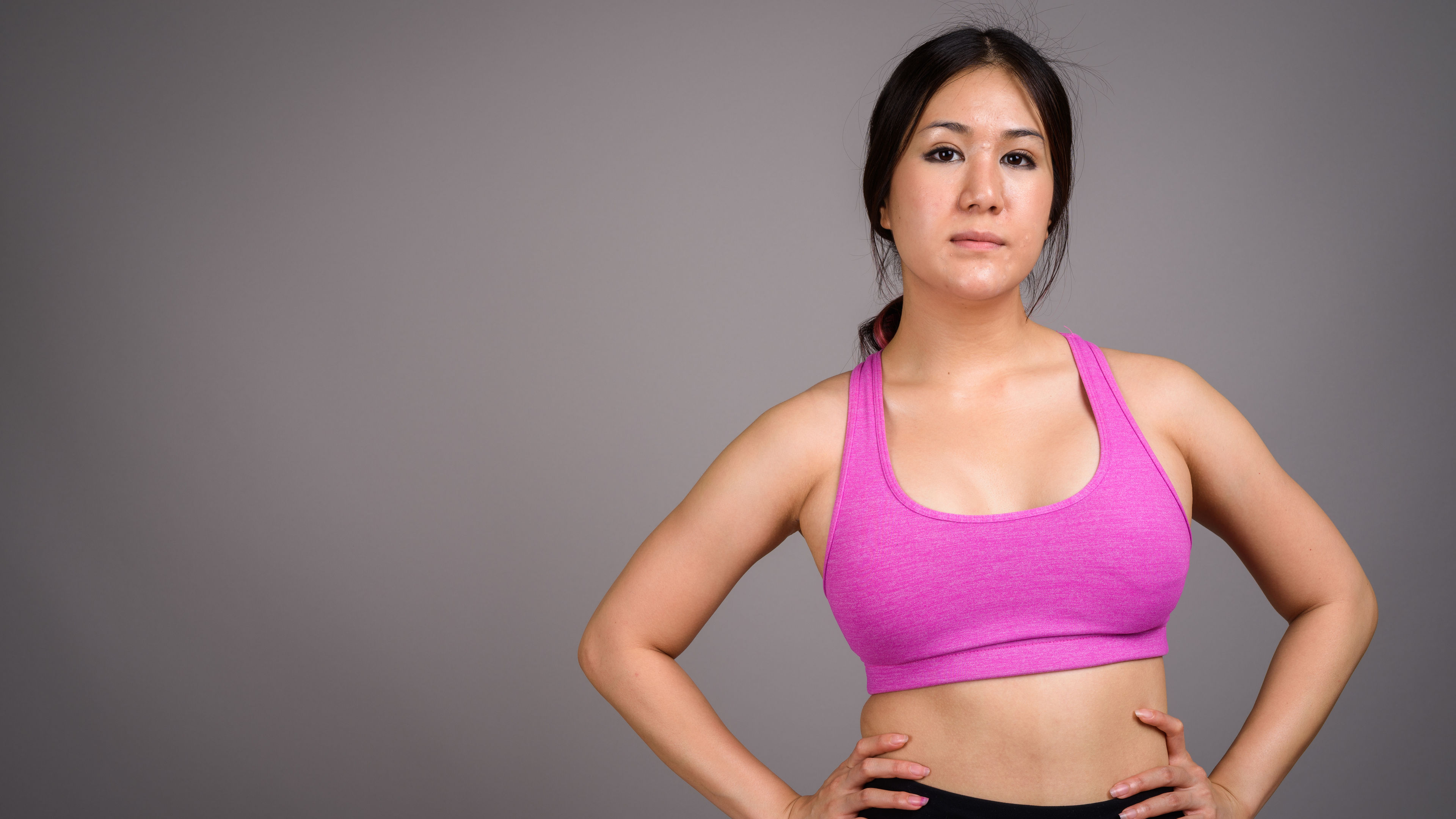 A woman wearing a sports bra