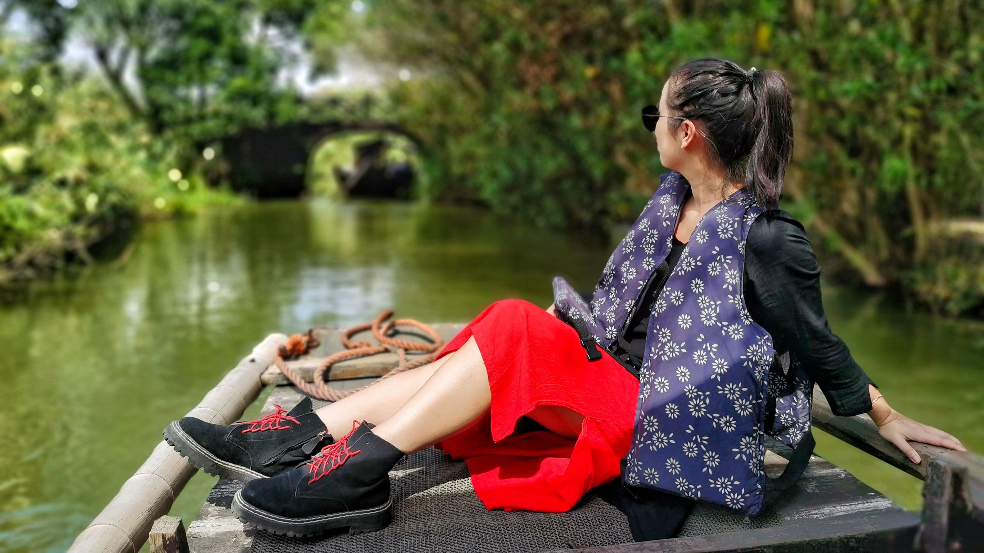A Young woman sitting in a boat