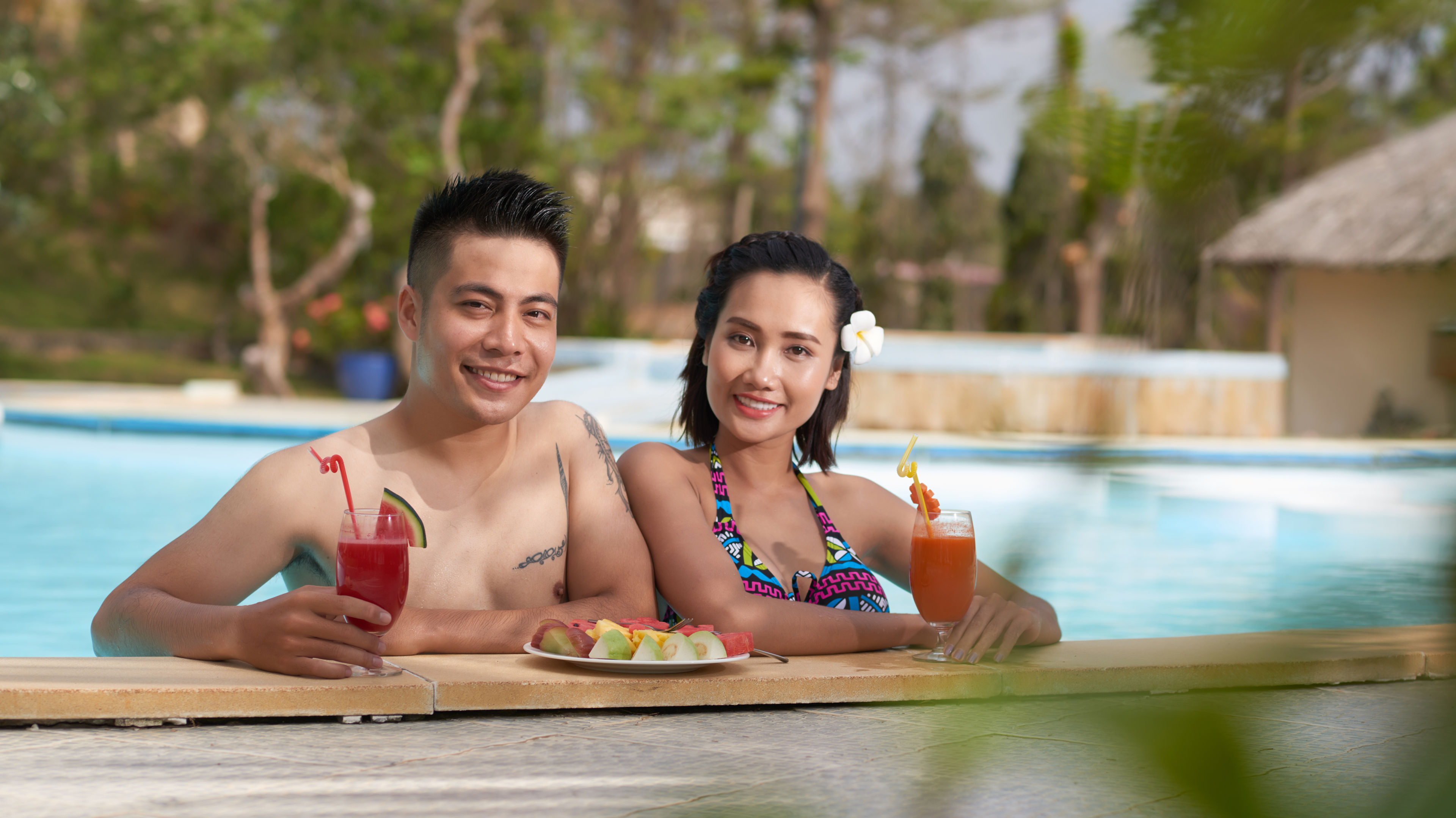 Couple at the swimming pool 