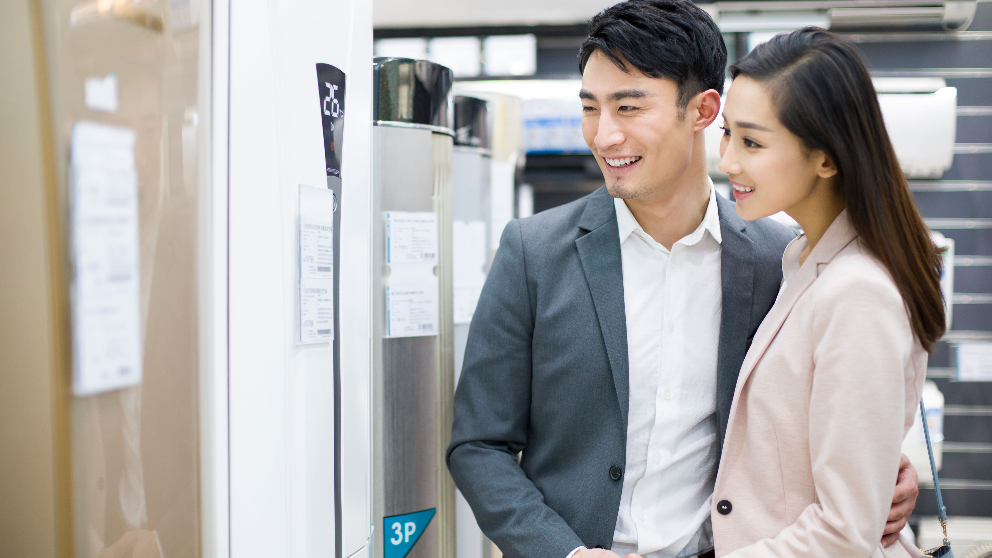 Young couple buying air purifier 